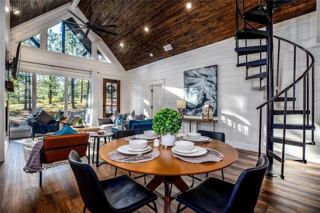 dining area with stairway, wooden ceiling, wood finished floors, high vaulted ceiling, and a ceiling fan