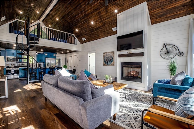 living room with high vaulted ceiling, dark wood-style floors, a large fireplace, wood walls, and wood ceiling