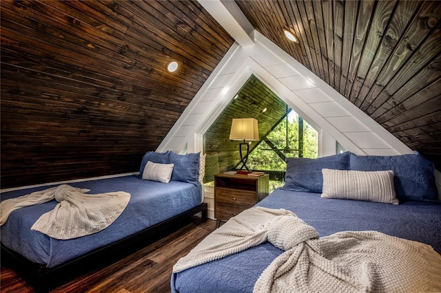 bedroom featuring vaulted ceiling, wood ceiling, wooden walls, and wood finished floors