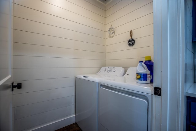 clothes washing area featuring laundry area and independent washer and dryer