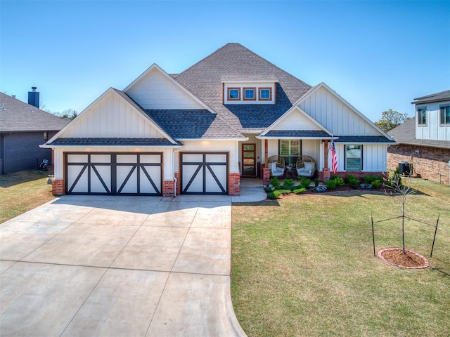 8800 Stark St, Arcadia, OK 73007 - view of front of property featuring a shingled roof, an attached garage, concrete driveway, brick siding, and a front lawn
