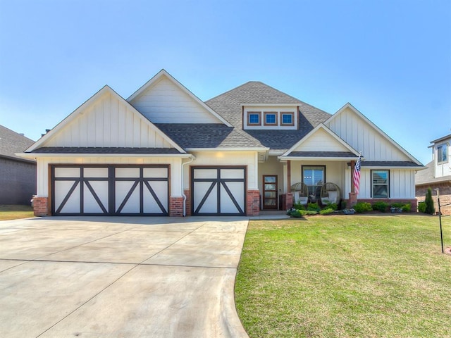 8800 Stark St, Arcadia, OK 73007 - view of front of house featuring a garage, concrete driveway, roof with shingles, brick siding, and a front lawn