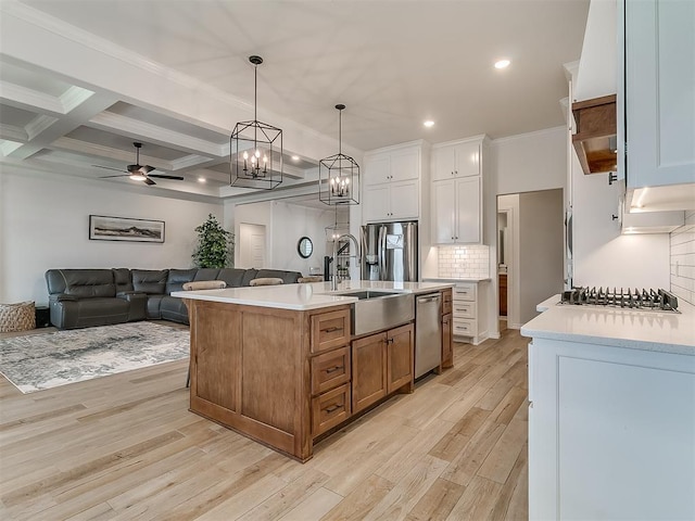 8800 Stark St, Arcadia, OK 73007 - kitchen featuring appliances with stainless steel finishes, light wood-style flooring, light countertops, decorative backsplash, and recessed lighting