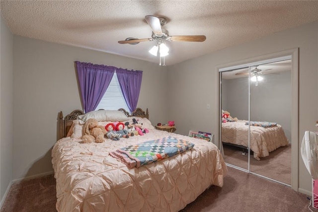 bedroom with a closet, carpet floors, a textured ceiling, and ceiling fan