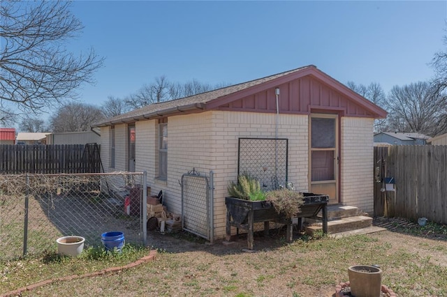 view of outbuilding with a fenced backyard