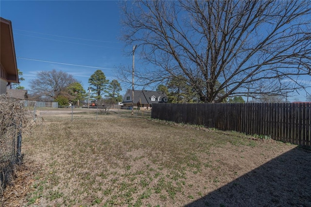 view of yard featuring fence