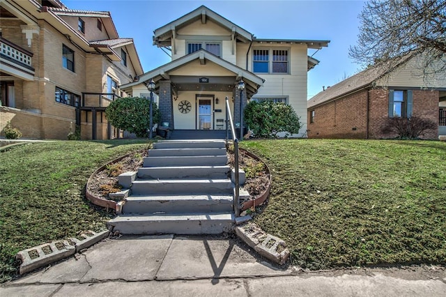 view of front of home with a front yard