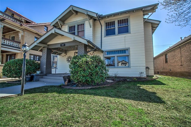 view of front of home with a front lawn