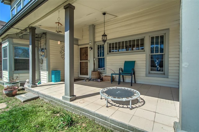 view of patio featuring a porch