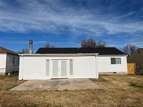 rear view of house featuring a patio