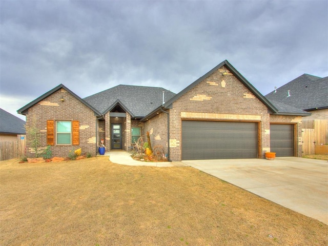 view of front facade with concrete driveway, brick siding, and a garage