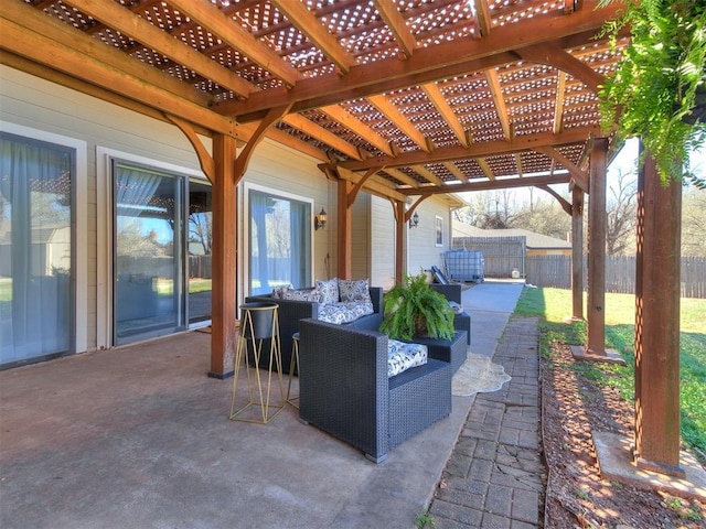 view of patio / terrace with fence, a pergola, and an outdoor hangout area