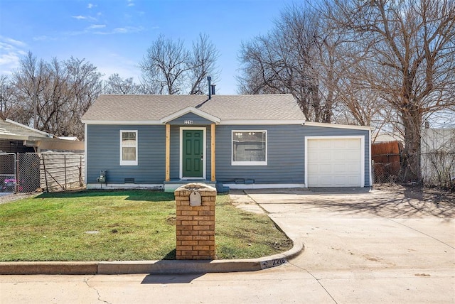 view of front of home featuring driveway, a front lawn, fence, roof with shingles, and a garage