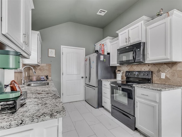 kitchen with visible vents, white cabinets, marble finish floor, black appliances, and a sink