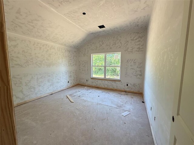 1500 Stirrup Way, Yukon, OK 73099 - spare room with vaulted ceiling