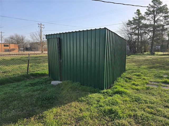 view of shed with fence