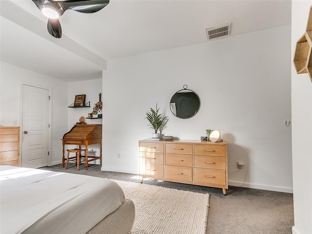 bedroom featuring baseboards, visible vents, and carpet floors