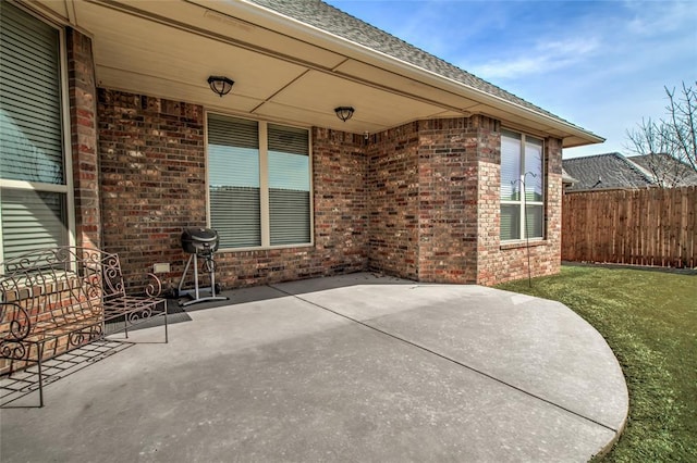 view of patio / terrace with fence