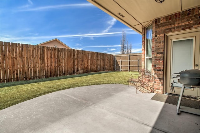 view of patio with a fenced backyard