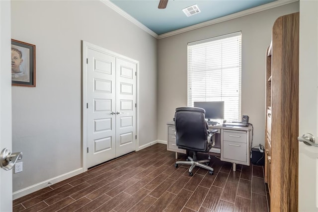 home office with visible vents, crown molding, ceiling fan, baseboards, and wood tiled floor