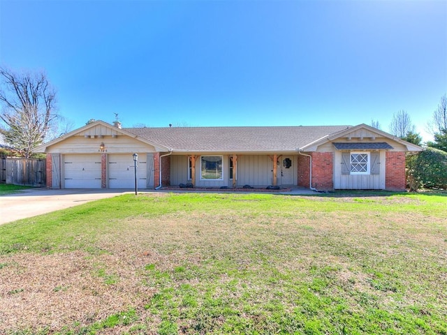 5700 N Billen Ave, Oklahoma City, OK 73112 - single story home featuring brick siding, a front lawn, fence, concrete driveway, and an attached garage
