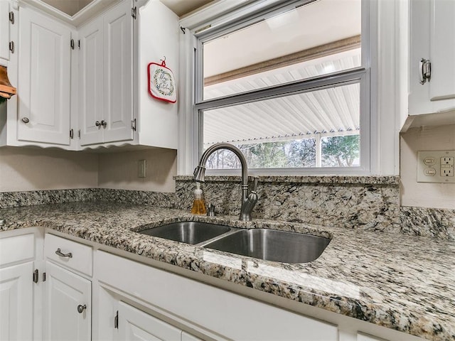 5700 N Billen Ave, Oklahoma City, OK 73112 - kitchen with white cabinets and a sink