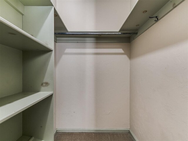 5700 N Billen Ave, Oklahoma City, OK 73112 - spacious closet featuring carpet floors
