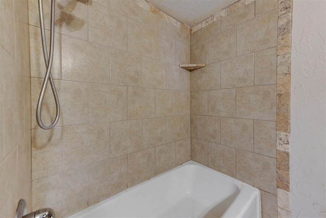 bathroom featuring a textured ceiling