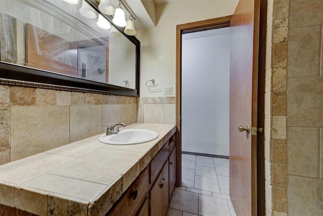 bathroom featuring tile patterned floors and vanity