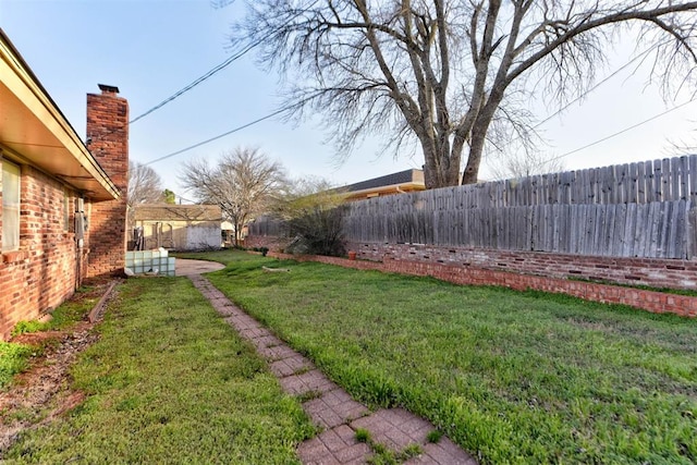 view of yard featuring a fenced backyard