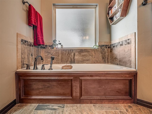 bathroom with a garden tub