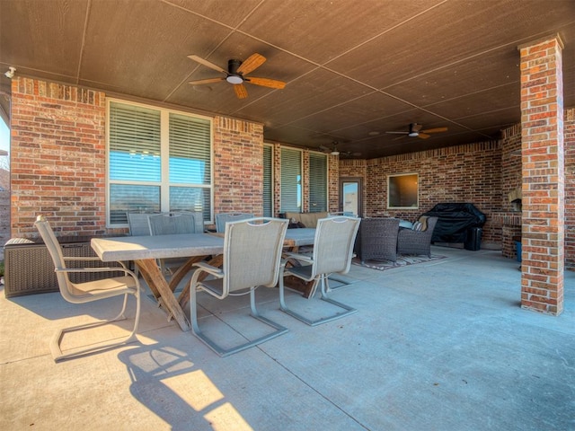 view of patio / terrace with outdoor dining area and a ceiling fan