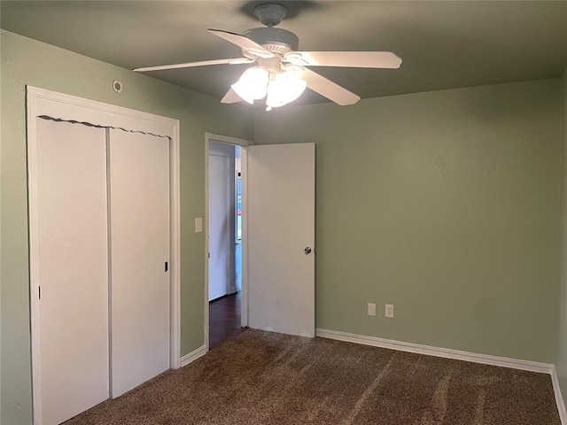 unfurnished bedroom with a ceiling fan, a closet, carpet floors, and baseboards