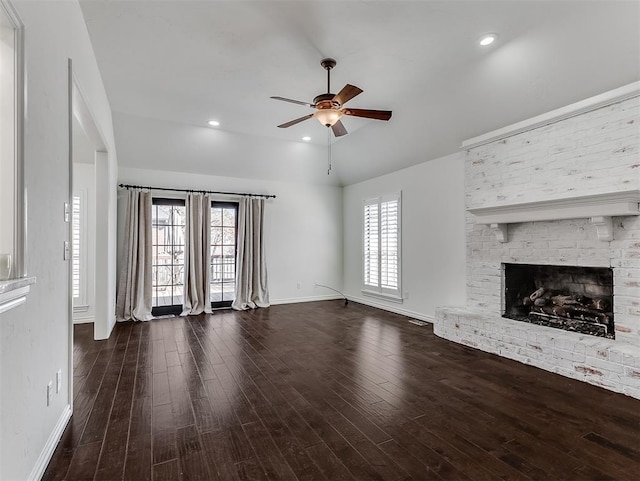 unfurnished living room with baseboards, recessed lighting, a fireplace, ceiling fan, and hardwood / wood-style flooring