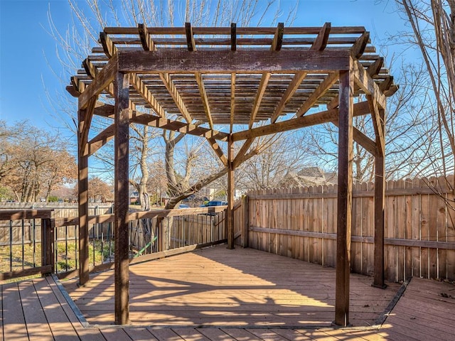 wooden deck with fence and a pergola