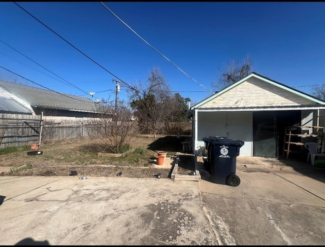 garage featuring fence