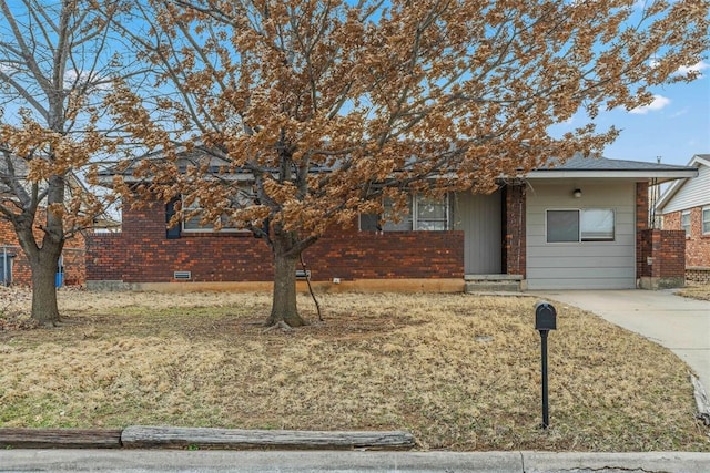 view of front of property featuring brick siding