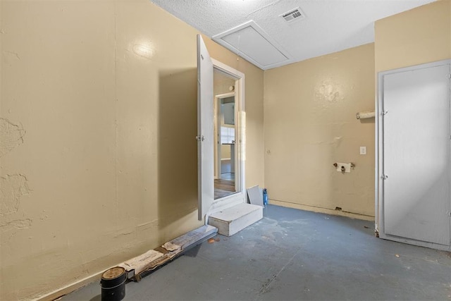 bathroom featuring visible vents and unfinished concrete floors