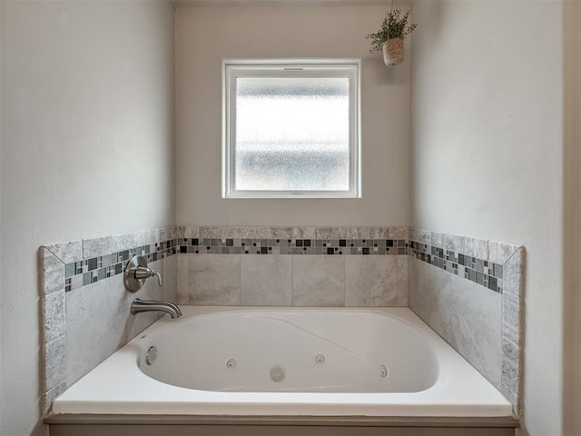 bathroom featuring a jetted tub