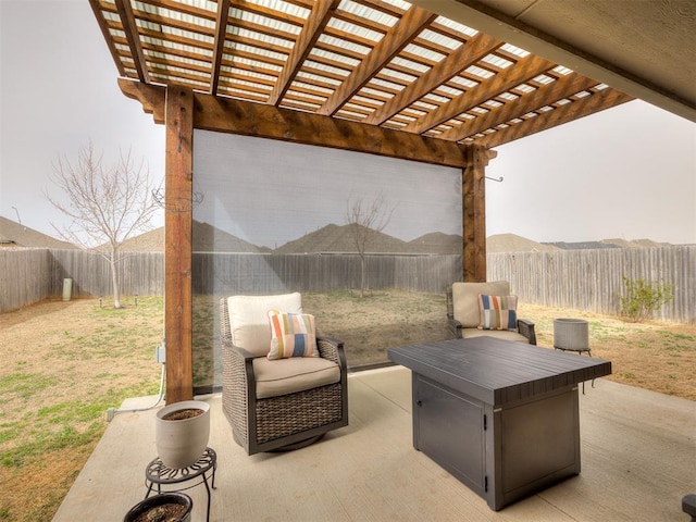 view of patio with a fenced backyard and a pergola