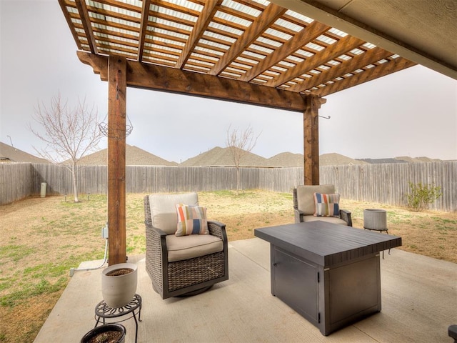 view of patio / terrace featuring a pergola and a fenced backyard