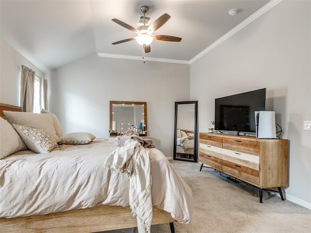 bedroom with ornamental molding, carpet, baseboards, ceiling fan, and vaulted ceiling