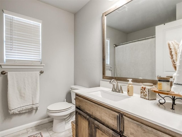 bathroom featuring visible vents, toilet, a shower with shower curtain, baseboards, and vanity