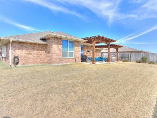 back of house featuring a pergola, a patio, fence, roof with shingles, and brick siding