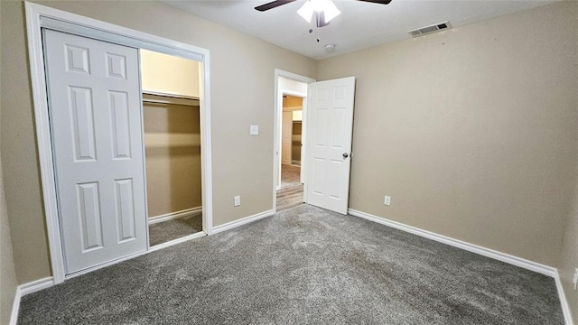 unfurnished bedroom featuring visible vents, carpet floors, baseboards, and ceiling fan