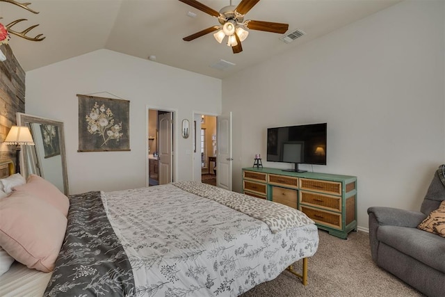 carpeted bedroom with visible vents, lofted ceiling, and ceiling fan