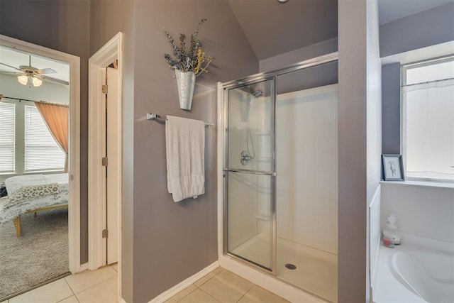 ensuite bathroom featuring a stall shower, a bath, tile patterned floors, ensuite bath, and a ceiling fan