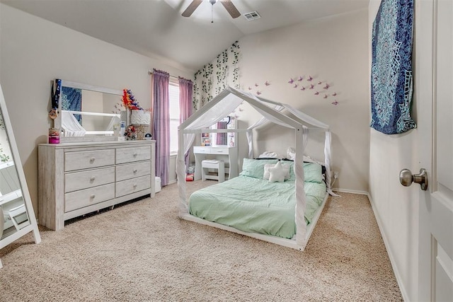 bedroom with visible vents, lofted ceiling, carpet flooring, baseboards, and ceiling fan