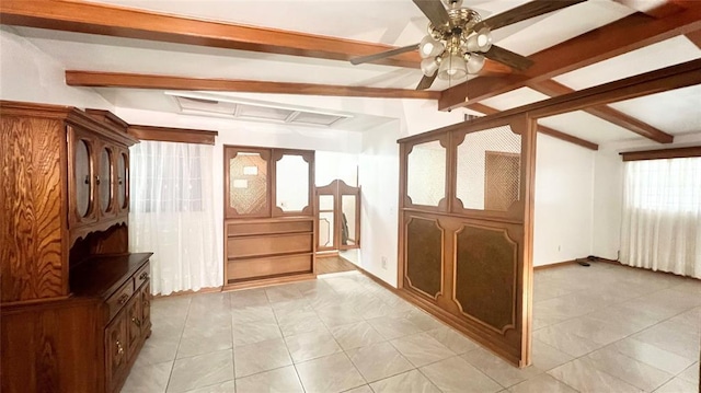 3731 Newport St, Oklahoma City, OK 73112 - interior space with baseboards, ceiling fan, and vaulted ceiling with beams