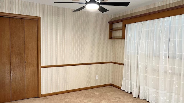 3731 Newport St, Oklahoma City, OK 73112 - unfurnished room featuring light colored carpet, wallpapered walls, ceiling fan, and baseboards